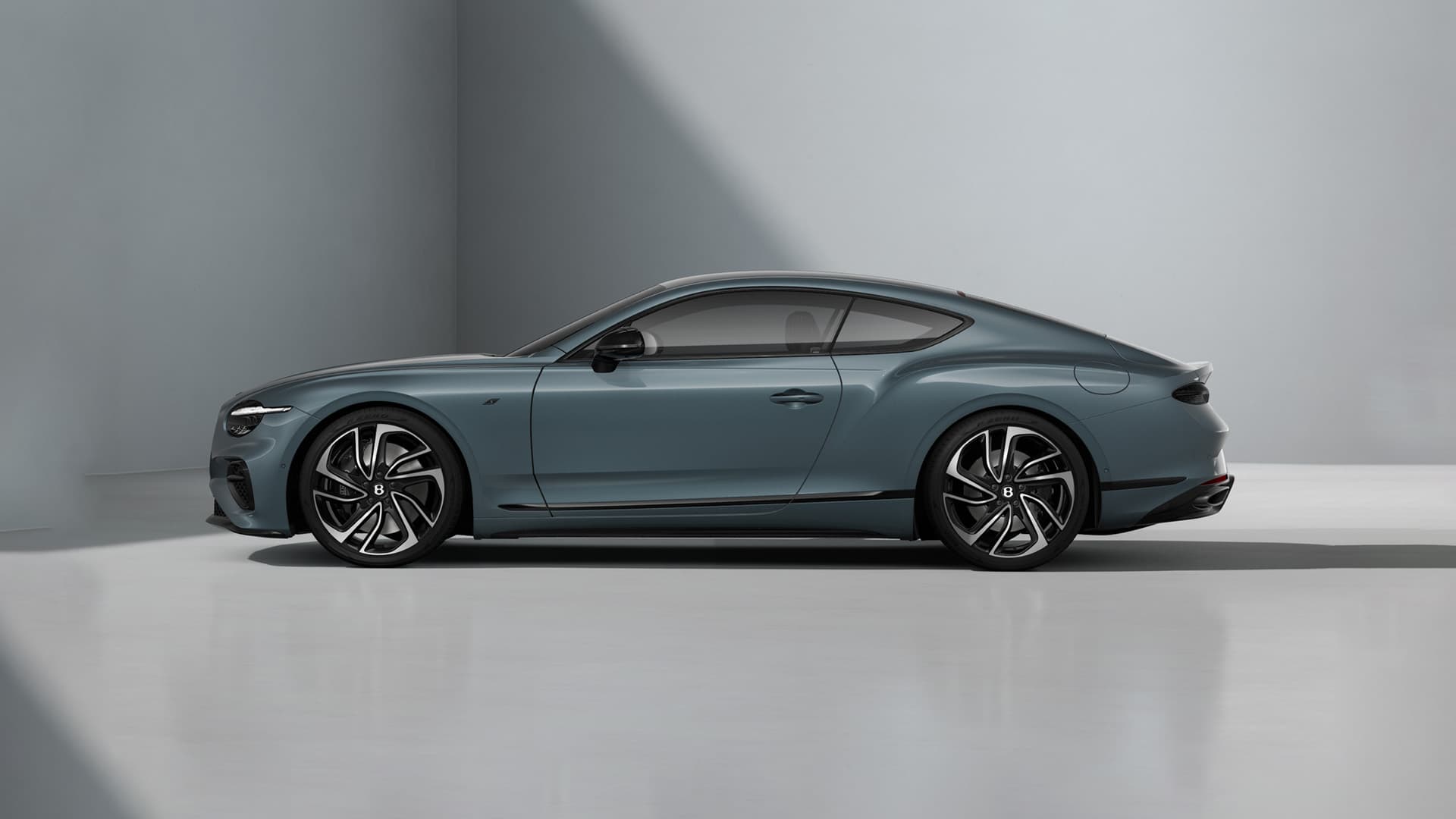 Bentley Continental GT S in teal blue — side profile